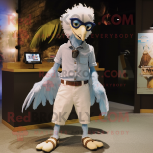 White Archeopteryx mascot costume character dressed with a Denim Shorts and Cufflinks