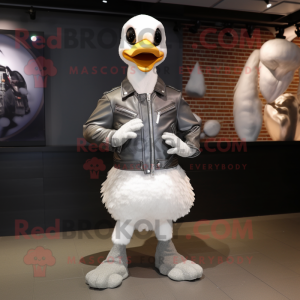 Silver Goose mascot costume character dressed with a Biker Jacket and Shoe clips