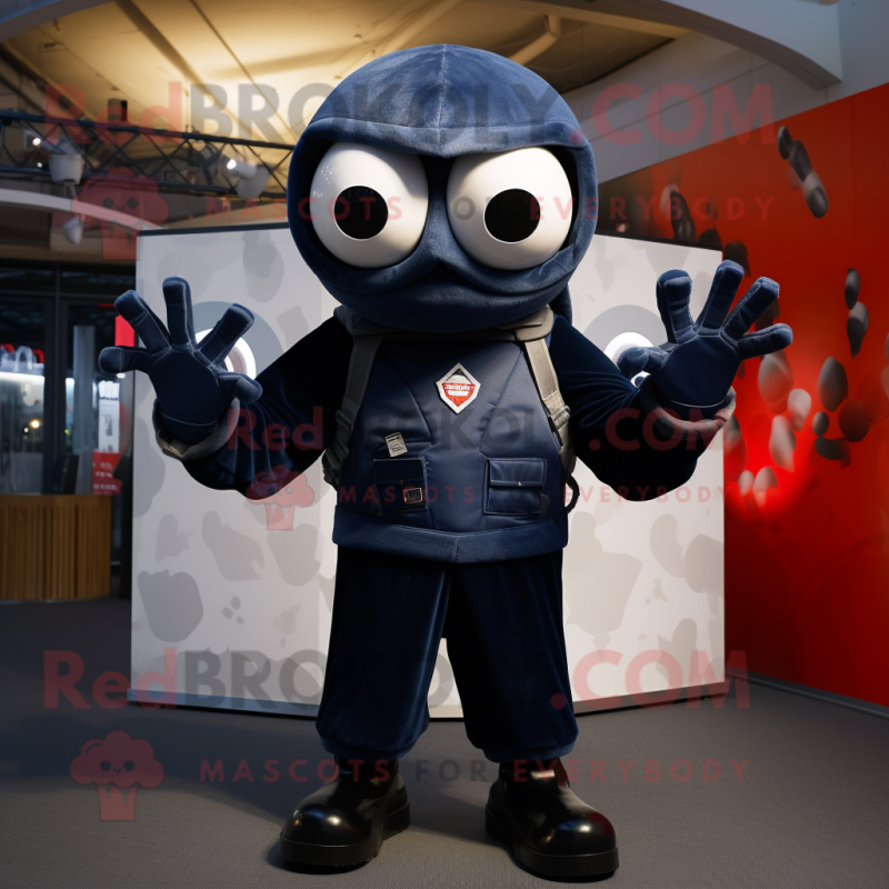 Navy Spider mascot costume character dressed with a Bomber Jacket and Mittens Navy Spider mascot costume character dressed with a Bomber Jacket and Mittens