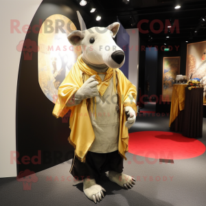 Gold Tapir mascot costume character dressed with a Bermuda Shorts and Shawls