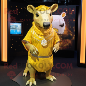 Gold Tapir mascot costume character dressed with a Bermuda Shorts and Shawls