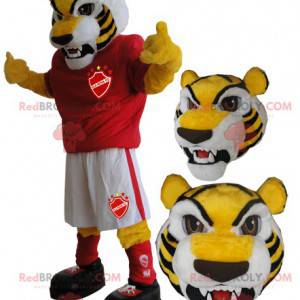 Mascote tigre amarelo em roupas esportivas - Redbrokoly.com