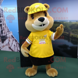 Yellow Otter mascot costume character dressed with a Rugby Shirt and Hat pins