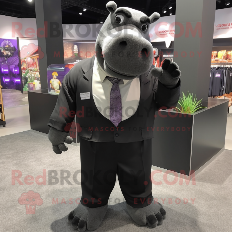 Black Hippopotamus mascot costume character dressed with a Suit Jacket and Suspenders