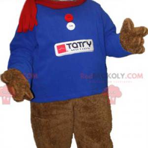 Mascotte d'ourson marron avec un sweat bleu et une écharpe -