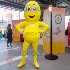 Lemon Yellow Guinness mascot costume character dressed with a Yoga Pants and Tie pins