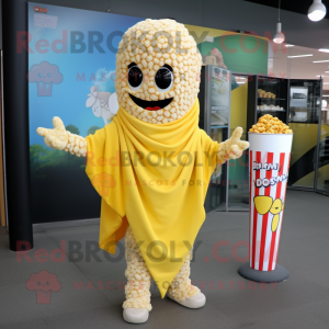Yellow Pop Corn mascot costume character dressed with a Cover-up and Scarf clips