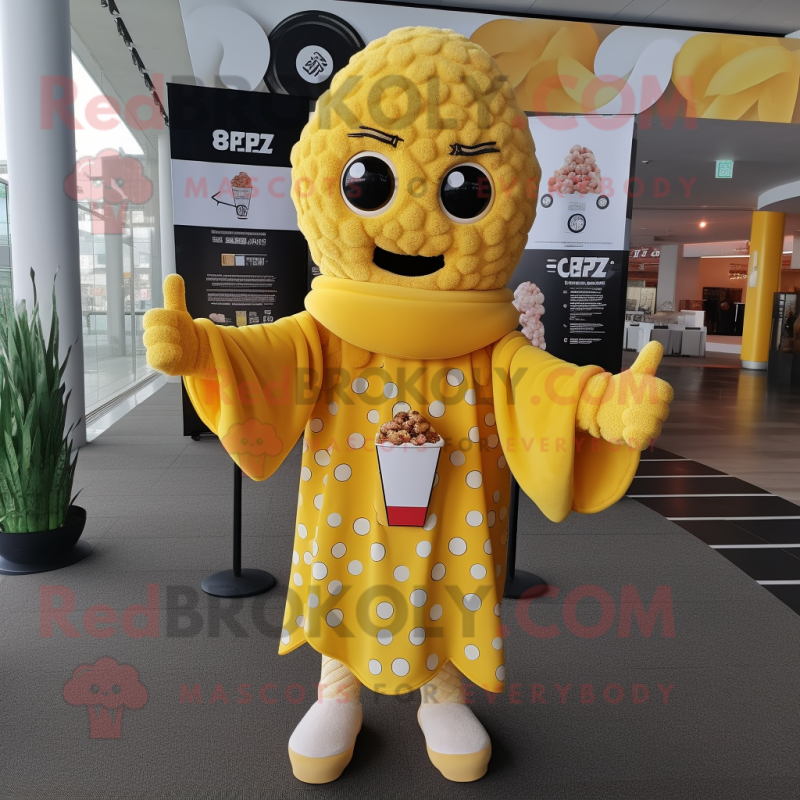 Yellow Pop Corn mascot costume character dressed with a Cover-up and Scarf clips Yellow Pop Corn mascot costume character dressed with a Cover-up and Scarf clips