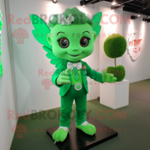 Green Cupid mascot costume character dressed with a Suit Jacket and Bracelet watches