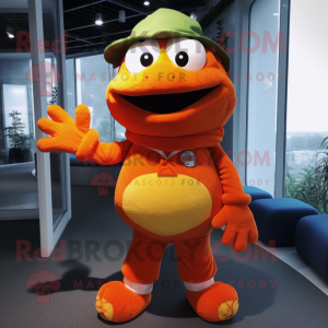 Orange Frog mascot costume character dressed with a Cardigan and Caps