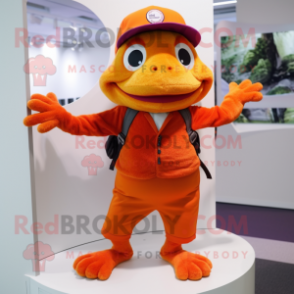 Orange Frog mascot costume character dressed with a Cardigan and Caps