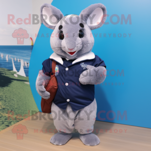 Navy Chinchilla mascot costume character dressed with a Bermuda Shorts and Backpacks