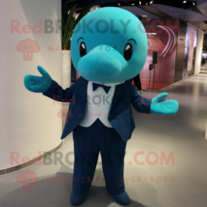 Teal Whale mascot costume character dressed with a Suit Pants and Hair clips