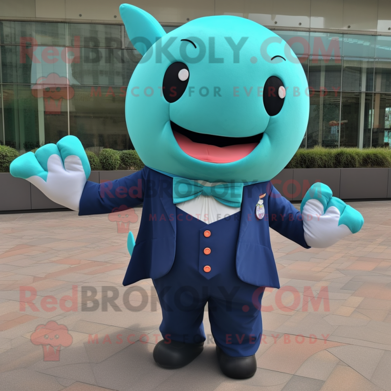 Teal Whale mascot costume character dressed with a Suit Pants and Hair clips