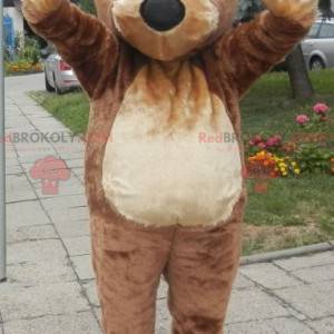 Zacht en schattig gigantische bruine beer mascotte. Teddybeer