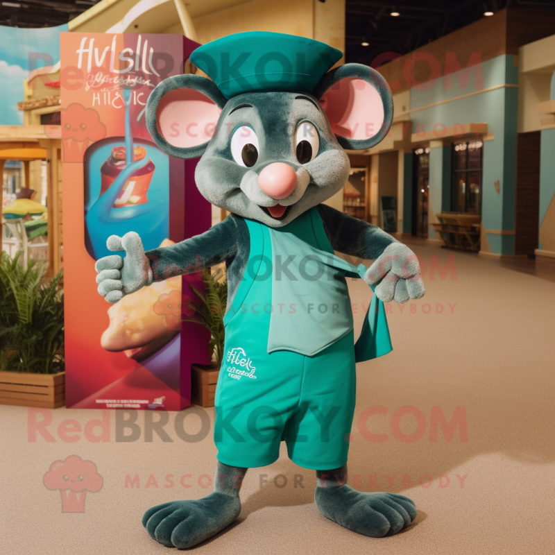 Teal Ratatouille mascot costume character dressed with a Board Shorts and Headbands Teal Ratatouille mascot costume character dressed with a Board Shorts and Headbands