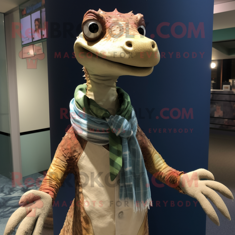 Tan Coelophysis mascot costume character dressed with a Button-Up Shirt and Shawls Tan Coelophysis mascot costume character dressed with a Button-Up Shirt and Shawls