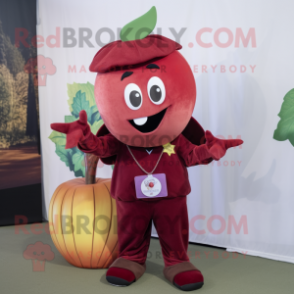 Maroon Apple mascot costume character dressed with a Corduroy Pants and Brooches