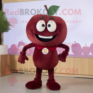 Maroon Apple mascot costume character dressed with a Corduroy Pants and Brooches