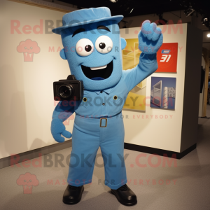 Blue Camera mascot costume character dressed with a Overalls and Tie pins