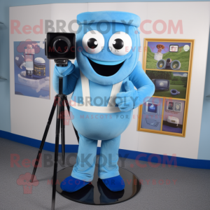 Blue Camera mascot costume character dressed with a Overalls and Tie pins