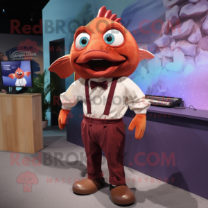 Maroon Goldfish mascot costume character dressed with a Poplin Shirt and Suspenders