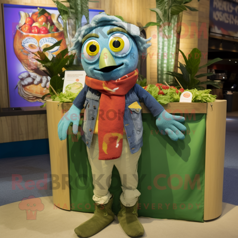Olive Fish Tacos mascot costume character dressed with a Chambray Shirt and Scarves Olive Fish Tacos mascot costume character dressed with a Chambray Shirt and Scarves