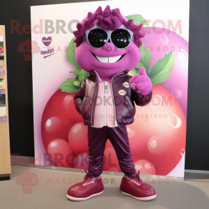 Pink Grape mascot costume character dressed with a Leather Jacket and Shoe clips