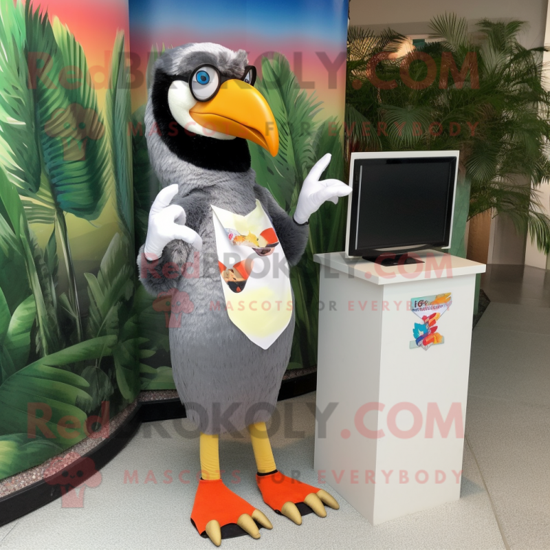 Silver Toucan mascot costume character dressed with a Shift Dress and Sunglasses Silver Toucan mascot costume character dressed with a Shift Dress and Sunglasses