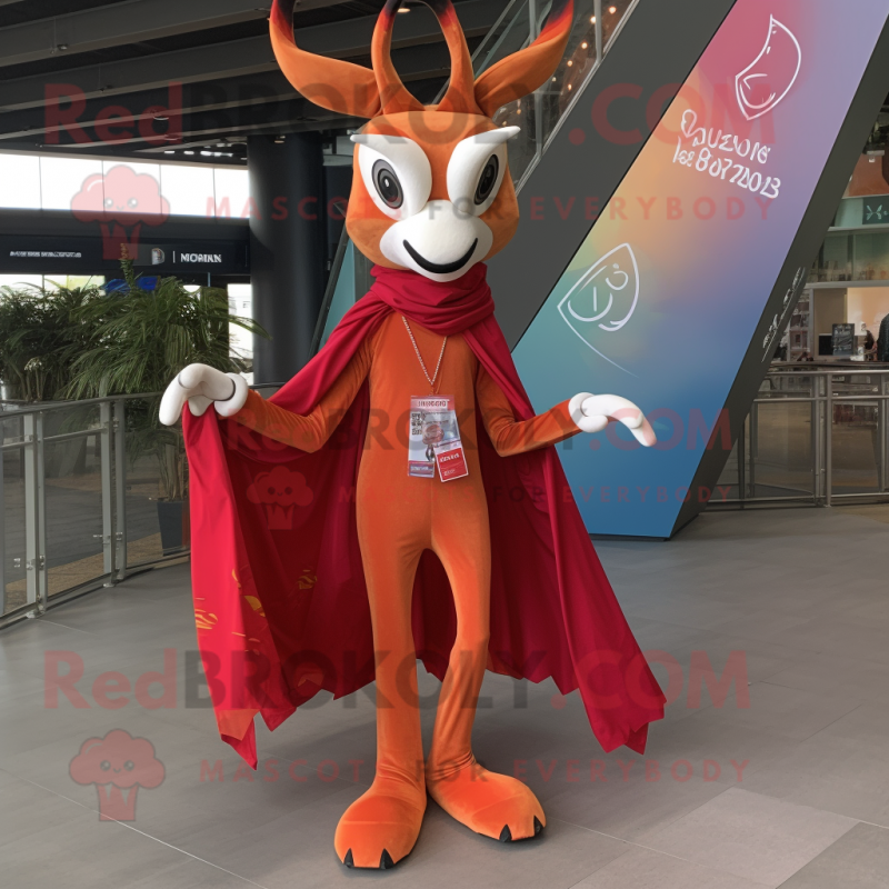 Red Gazelle mascot costume character dressed with a Flare Jeans and Shawl pins Red Gazelle mascot costume character dressed with a Flare Jeans and Shawl pins