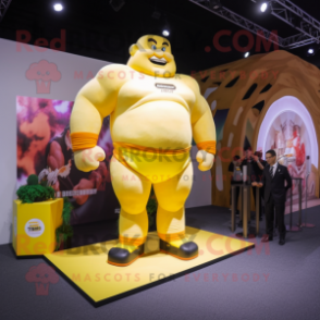 Yellow Strongman mascot costume character dressed with a Suit and Anklets