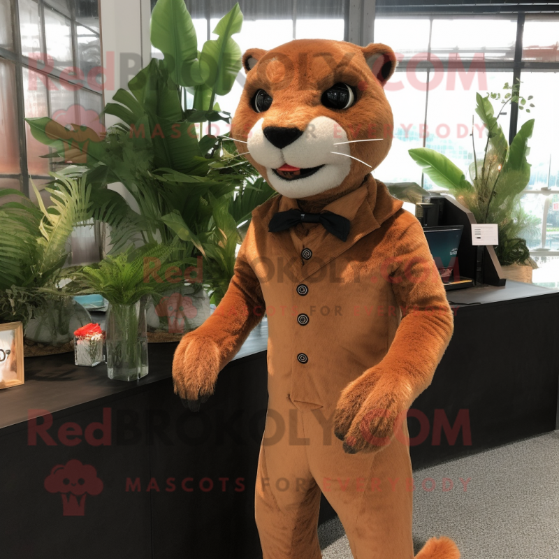 Rust Jaguarundi mascot costume character dressed with a Suit Pants and Brooches Rust Jaguarundi mascot costume character dressed with a Suit Pants and Brooches
