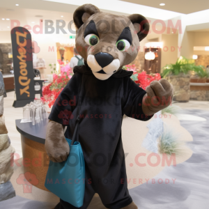 Black Mountain Lion mascot costume character dressed with a Cover-up and Handbags