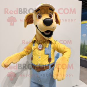 Yellow Dog mascot costume character dressed with a Chambray Shirt and Belts