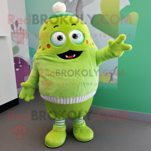Lime Green Cupcake mascot costume character dressed with a Cardigan and Mittens
