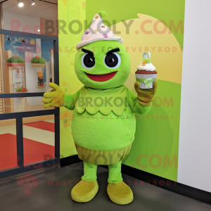 Lime Green Cupcake mascot costume character dressed with a Cardigan and Mittens