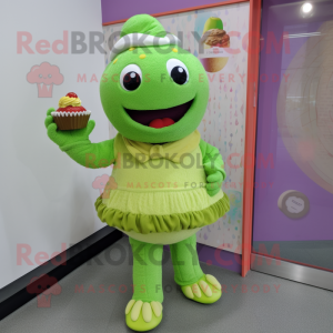 Lime Green Cupcake mascot costume character dressed with a Cardigan and Mittens