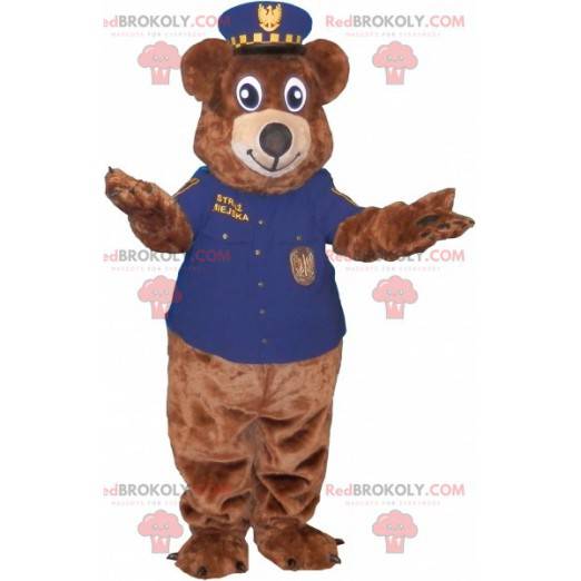 Mascotte dell'orso bruno vestito in uniforme della polizia -