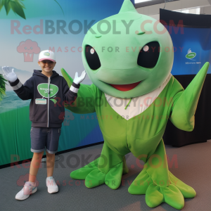 Green Manta Ray mascot costume character dressed with a Cargo Shorts and Mittens