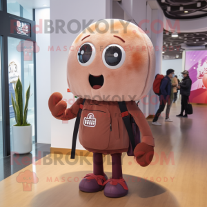 Brown Jellyfish mascot costume character dressed with a Sweatshirt and Handbags