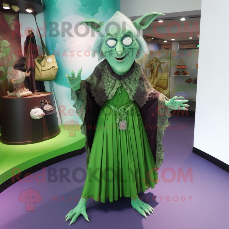Green Witch mascot costume character dressed with a Wrap Dress and Handbags Green Witch mascot costume character dressed with a Wrap Dress and Handbags