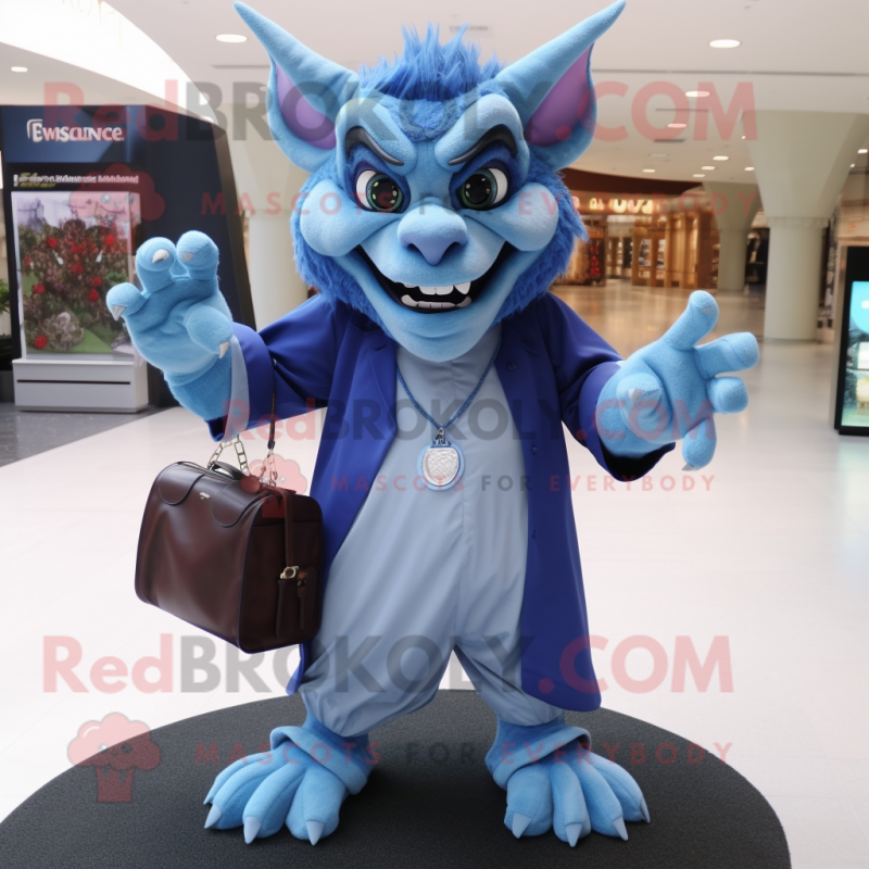 Blue Gargoyle mascot costume character dressed with a Dress Pants and Messenger bags Blue Gargoyle mascot costume character dressed with a Dress Pants and Messenger bags