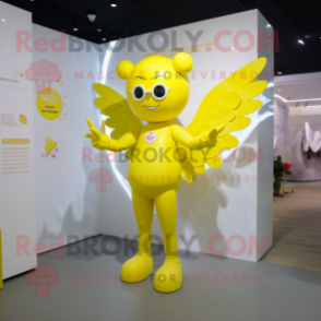 Yellow Cupid mascot costume character dressed with a Swimwear and Headbands