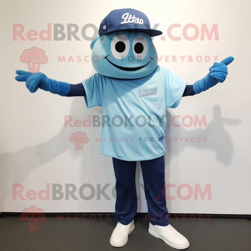 Blue Ray mascot costume character dressed with a Henley Shirt and Caps