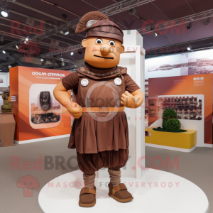 Brown Roman Soldier mascot costume character dressed with a Overalls and Shawl pins