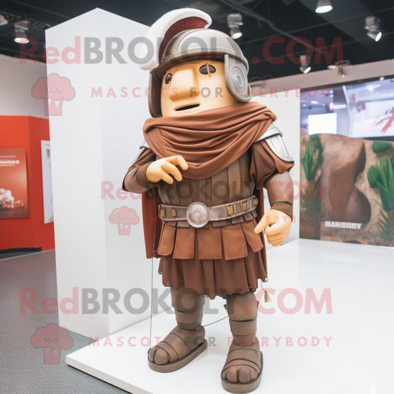 Brown Roman Soldier mascot costume character dressed with a Overalls and Shawl pins