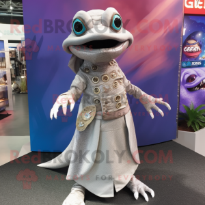 Silver Geckos mascot costume character dressed with a Wrap Skirt and Hat pins