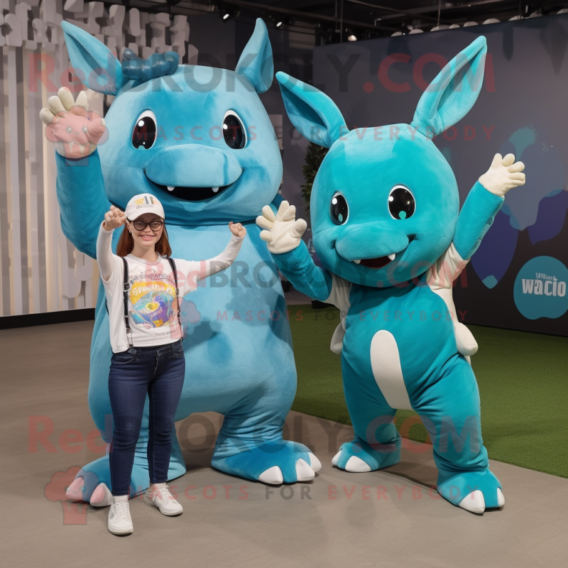Teal Rhinoceros mascot costume character dressed with a Mom Jeans and Keychains Teal Rhinoceros mascot costume character dressed with a Mom Jeans and Keychains