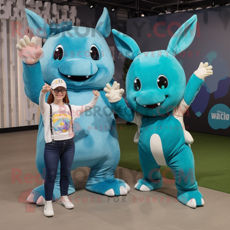 Teal Rhinoceros mascot costume character dressed with a Mom Jeans and Keychains