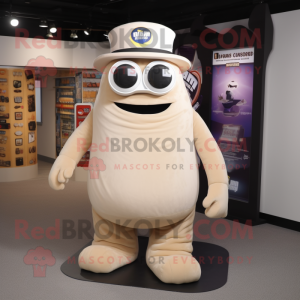 Beige Cyclops mascot costume character dressed with a Tank Top and Hat pins